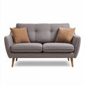 Two-seat grey fabric sofa with wooden legs and two accent pillows